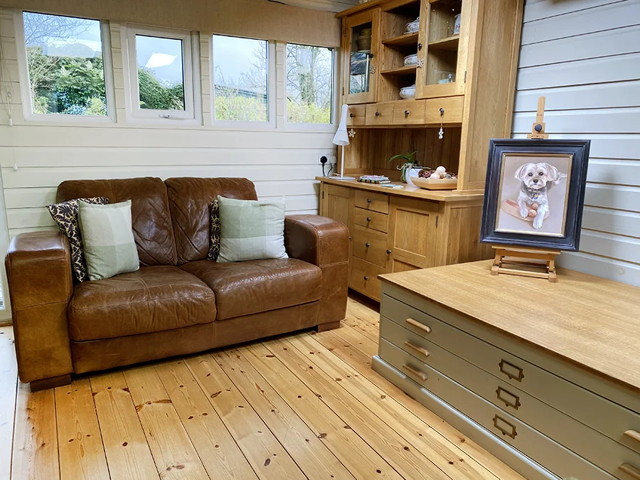 Melanie's vintage plan chest, used for storing art papers, canvases, and frames.