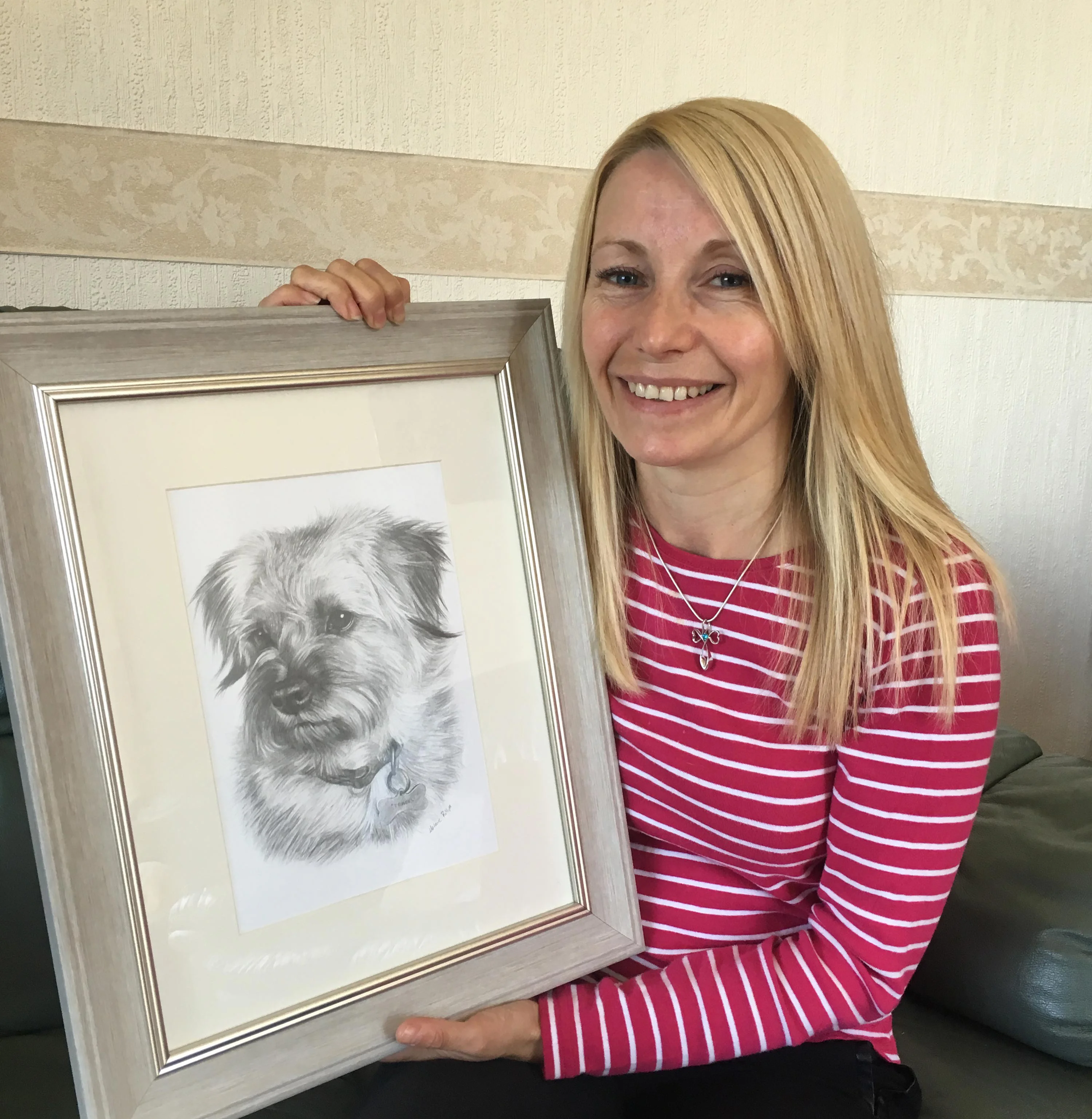 Two 12x10 inch pencil dog portraits displayed side-by-side, including Teasel's drawing.